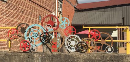 Metal sculpture outdoor art tour in Asheville River Arts District.