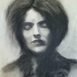 Mina Loy. Her eyes are closed, and she is secretly smiling.